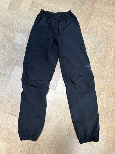 Jack Wolfskin Regenbroek Junior zwart (maat 164), Broek, Jongen of Meisje, Jack Wolfskin, Ophalen of Verzenden