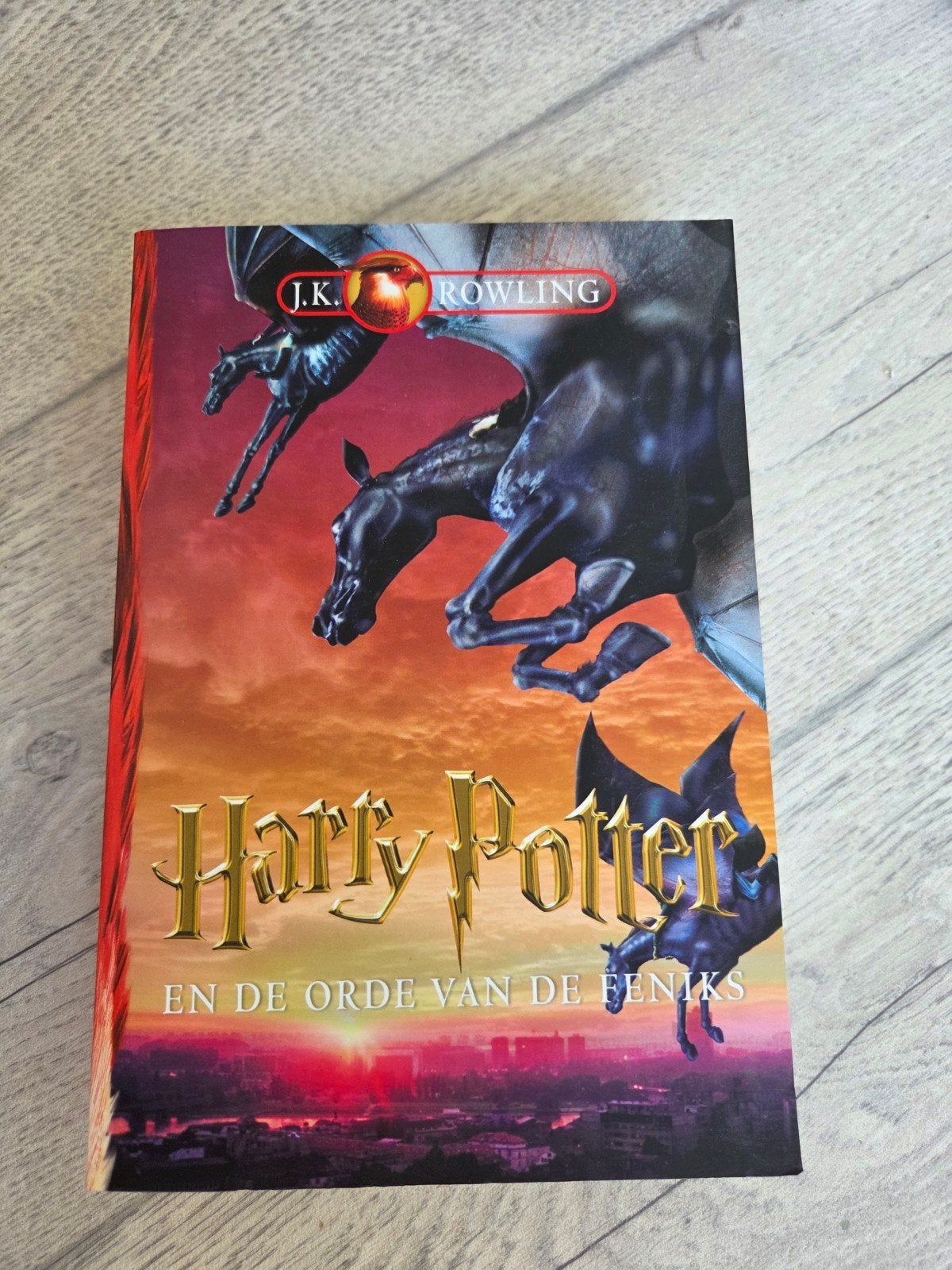 Harry Potter en de orde van de Feniks NL, Ophalen of Verzenden, Zo goed als nieuw, Boek of Poster