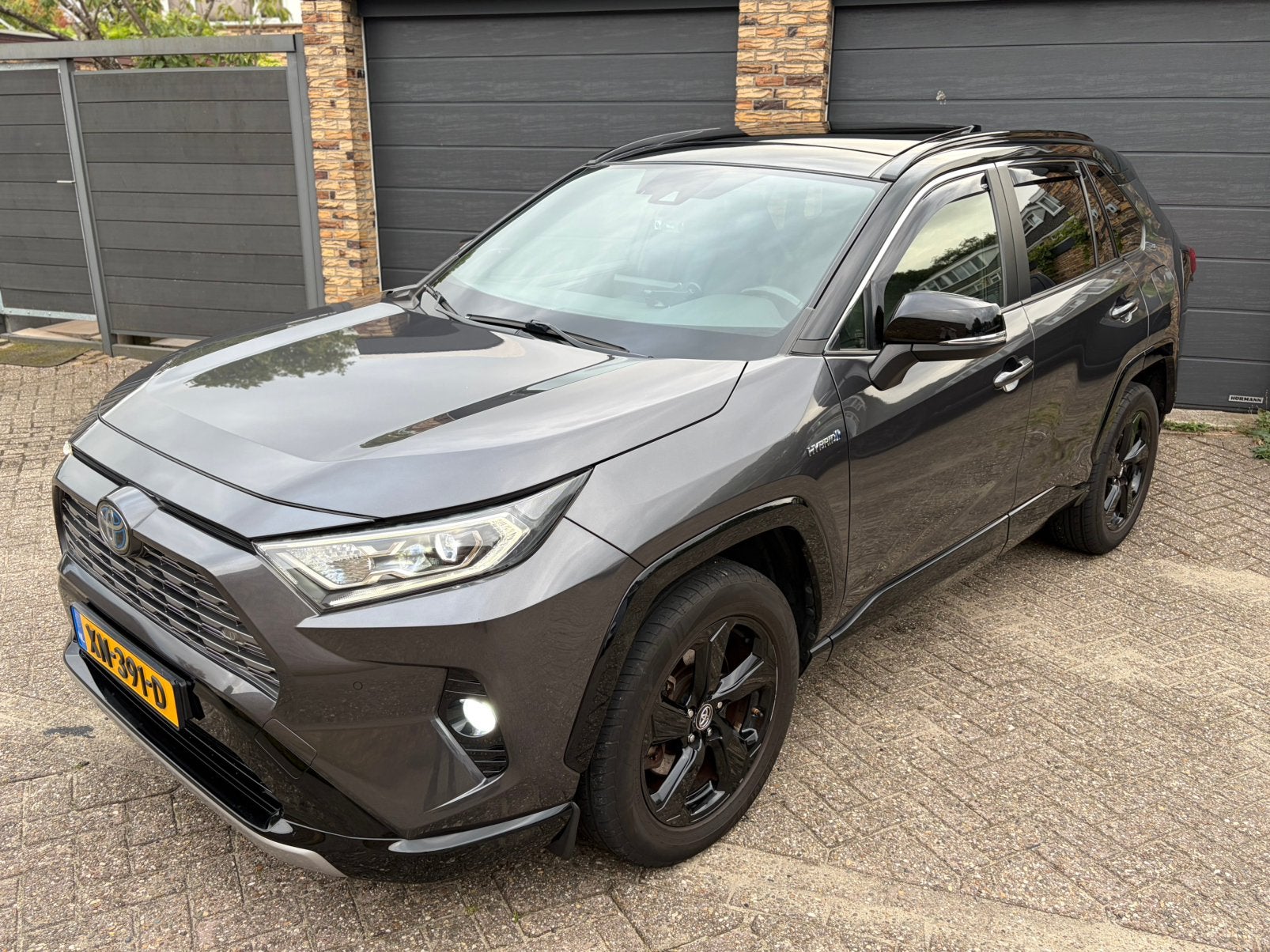 Toyota Rav4 2.5 Hybrid 222pk Bi Tone PANO DAK Nap Vol Opties, Auto's, Automaat, 4 cilinders, 2487 cc, 22 km/l