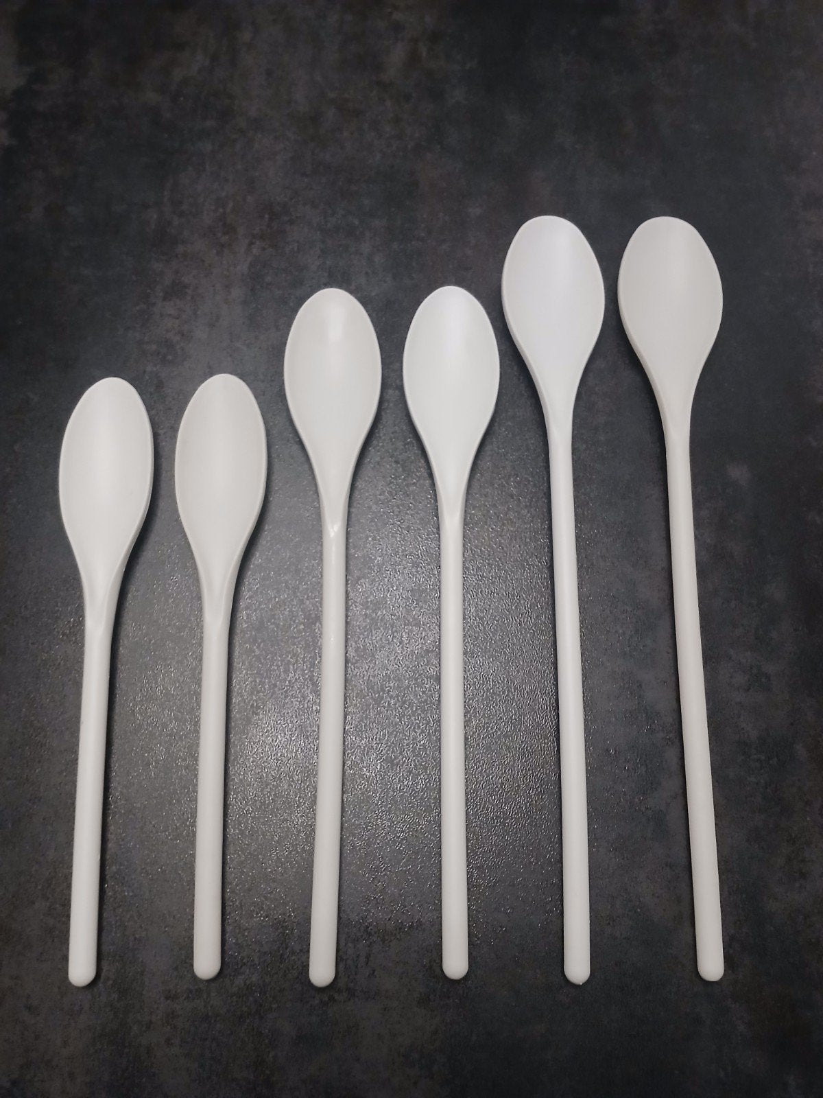 Set van zes witte roerlepels, Ophalen of Verzenden, Rvs of Chroom
