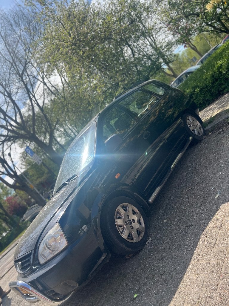 Kia Carens 1.8 I 16V 5P E4 2003 Zwart, Stof, Zwart, Stationwagon, Handgeschakeld