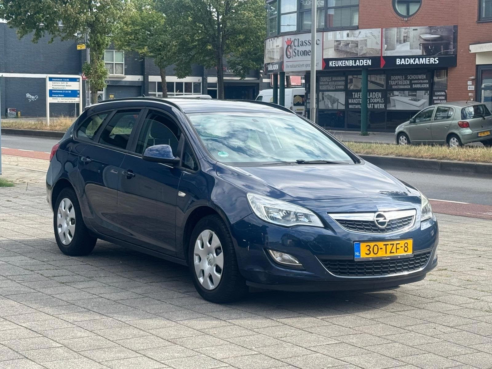 Opel Astra Sports Tourer 1.4-airco/apk 08-2027/2eigenaar/Nav, Auto's, Opel, Voorwielaandrijving, Euro 5, Gebruikt, 4 cilinders