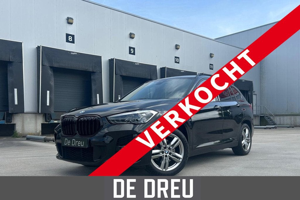 BMW X1 SDrive18i High Executive | M-SPORT | SHADOWLINE | EL, Auto's, 136 pk, Gebruikt, Leder en Stof, Zwart
