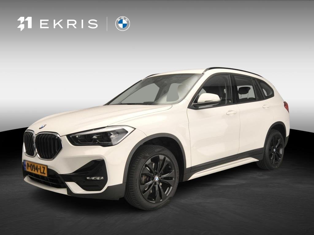 BMW X1 sDrive18i | LED | HUD | Trekhaak | Sportstoelen | Sha, Auto's, 12 maanden, Gebruikt, Euro 6, Wit
