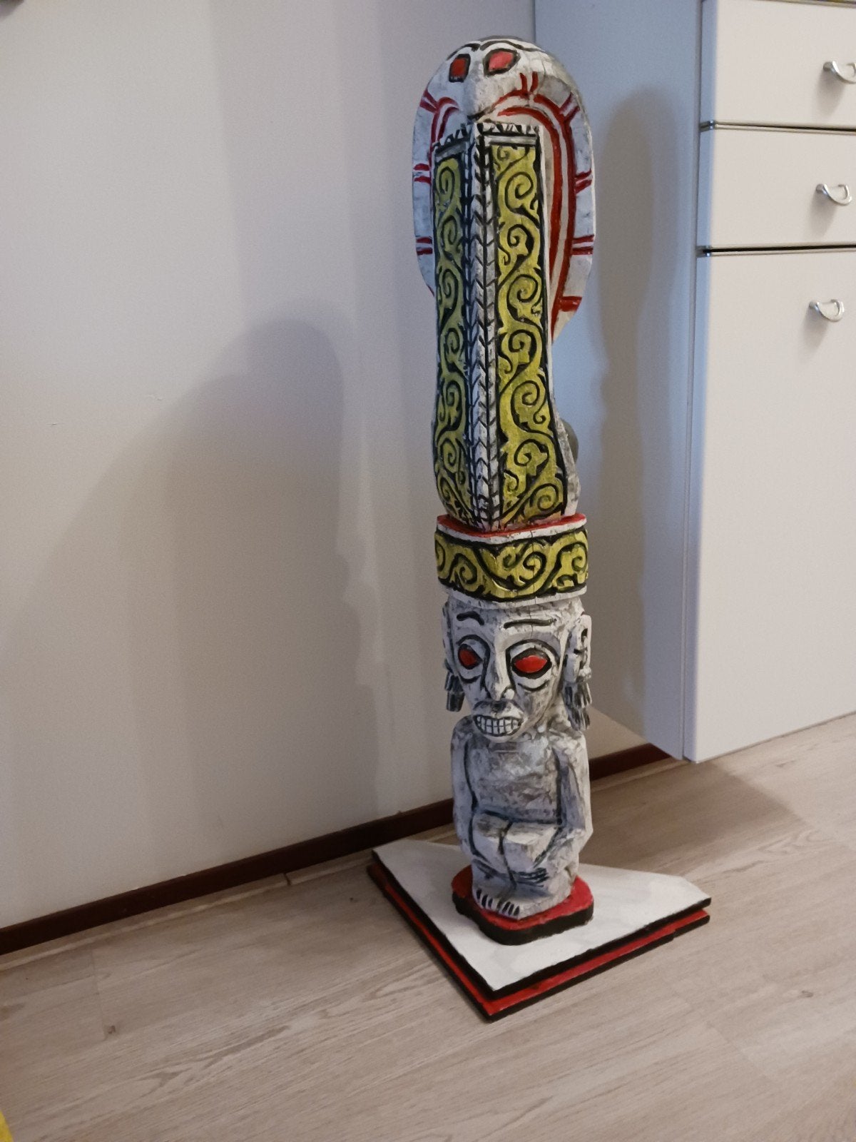 Beschilderd houtsnijwerk, Ophalen