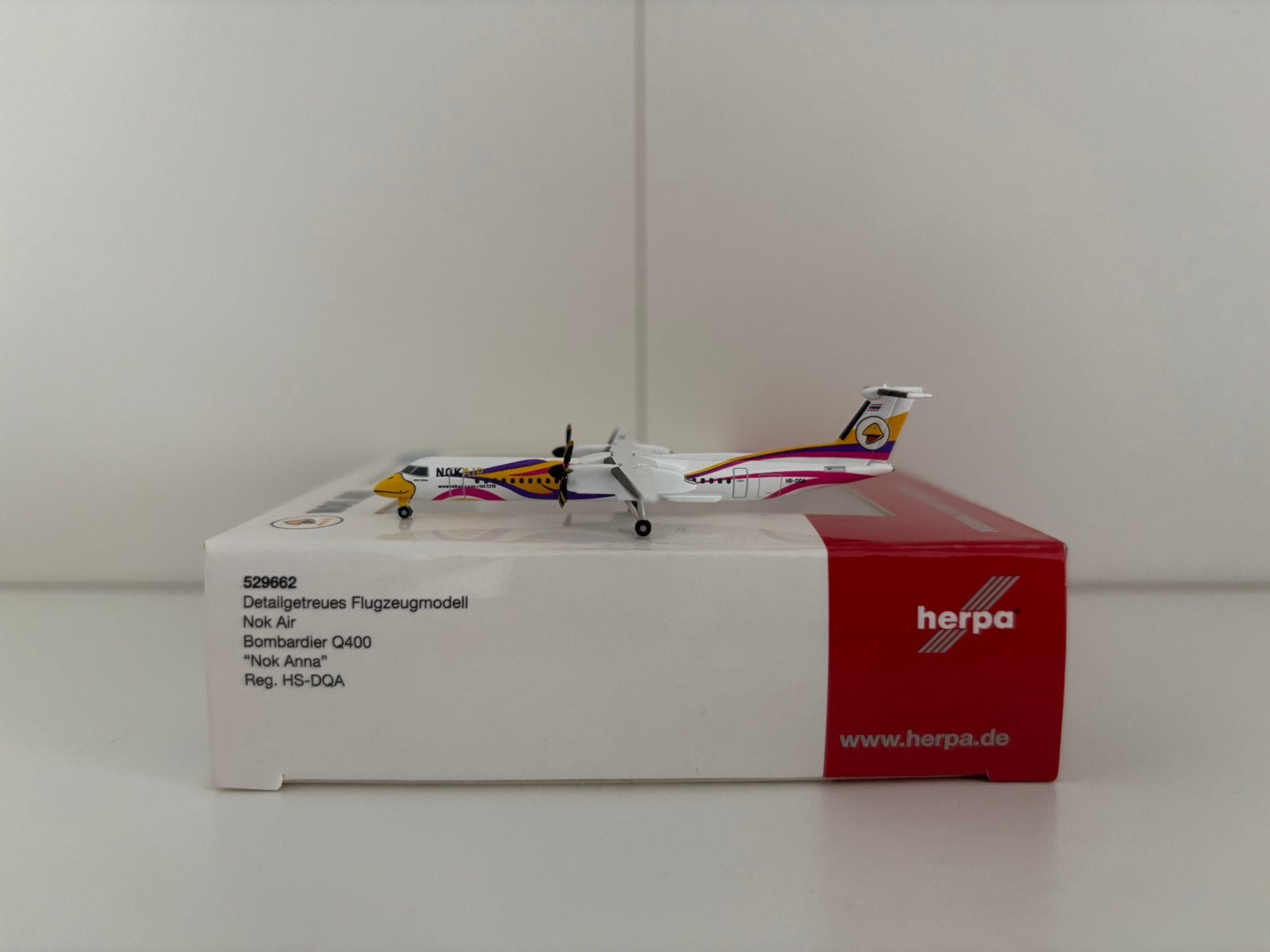 Herpa 529662 Nok Air Bombardier Q400 1:500, Verzamelen, Ophalen of Verzenden, Zo goed als nieuw, Schaalmodel