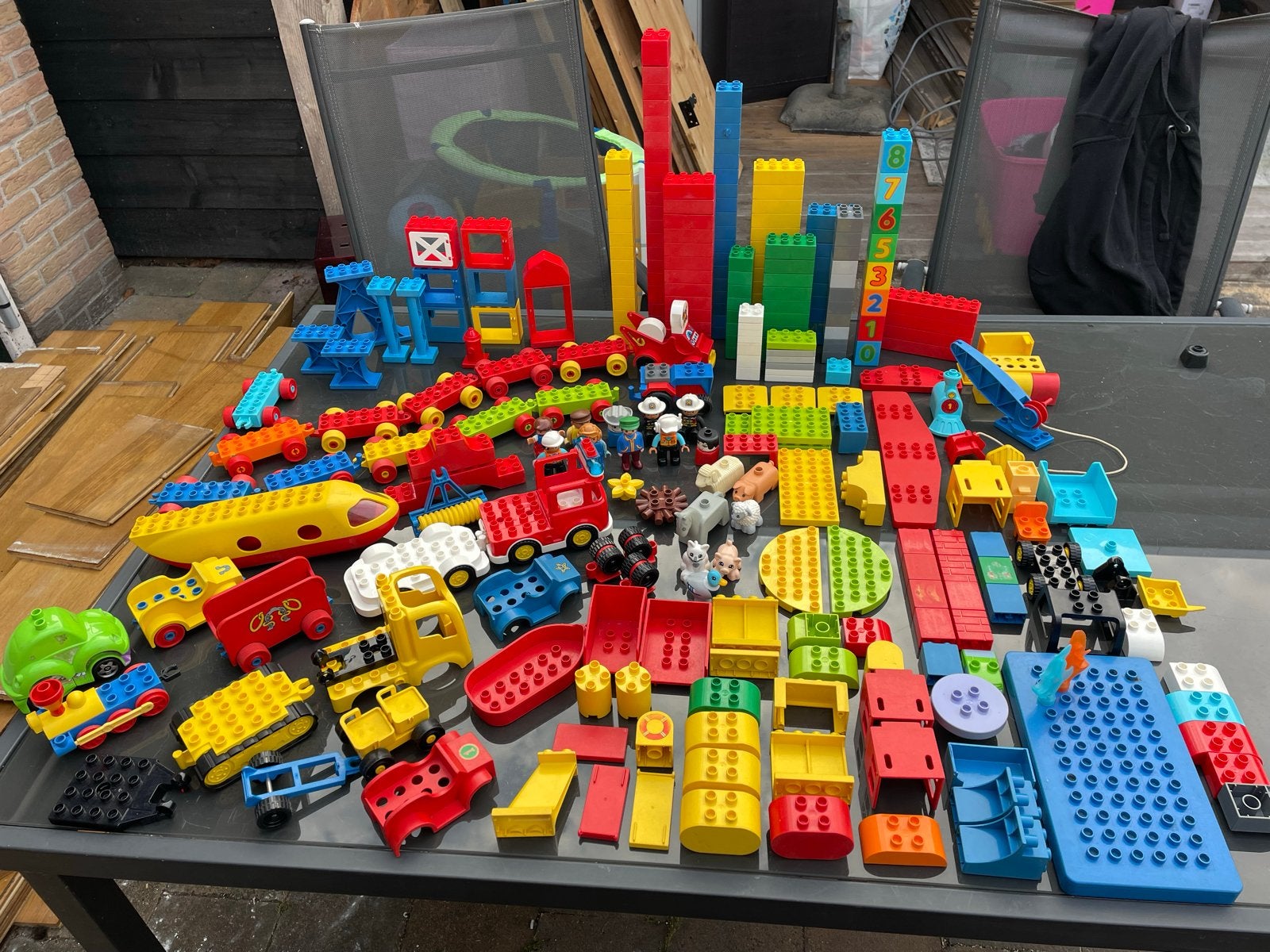 Grote partij Lego Duplo met voertuigen en figuren, Kinderen en Baby's, Speelgoed | Duplo en Lego, Ophalen, Inclusief minifiguren