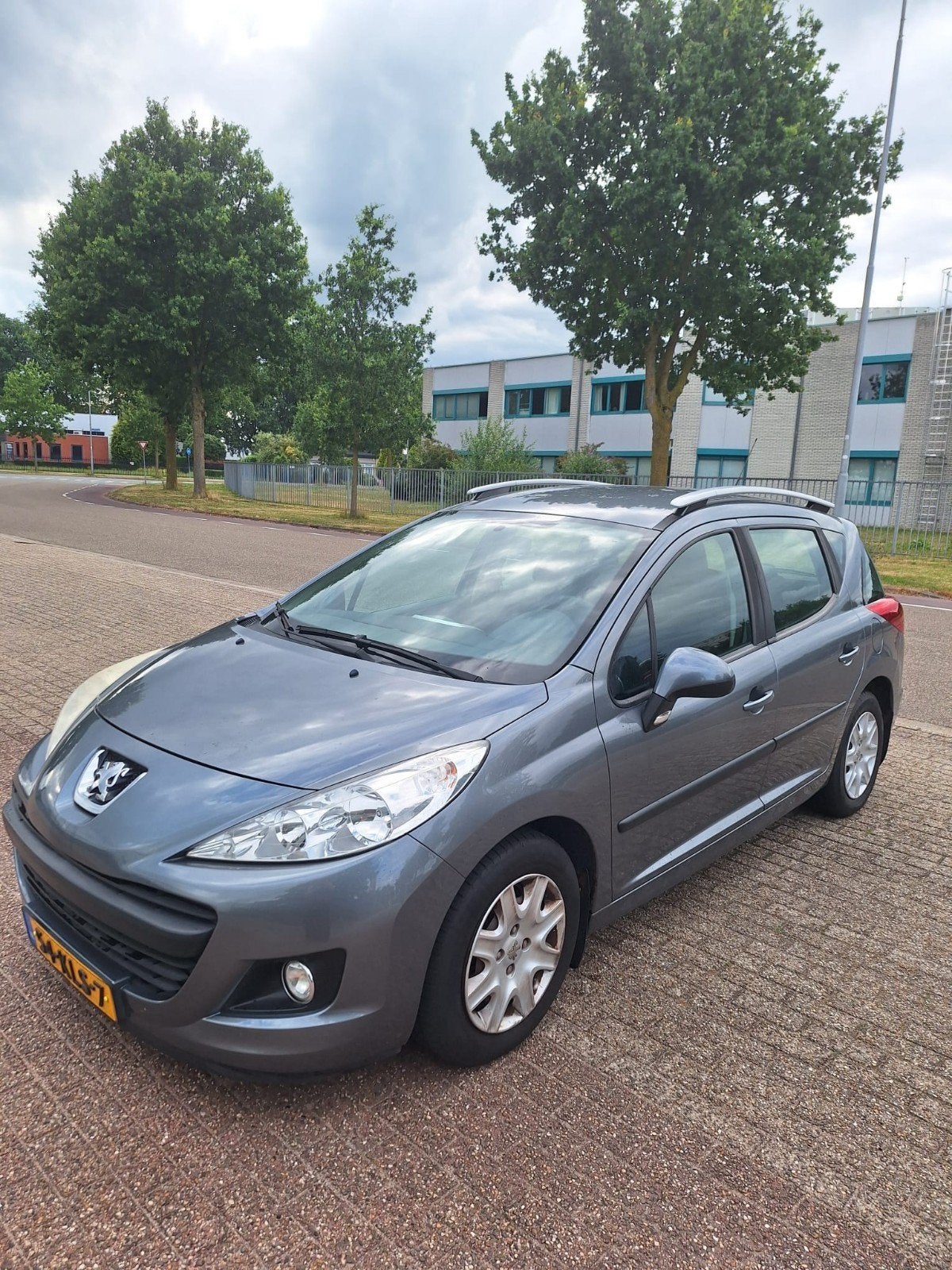 €1.450,- OPHALEN! Peugeot 207 1.4 95pk 2010 Grijs, Auto's, Peugeot, Voorwielaandrijving, Stof, Zwart, Origineel Nederlands