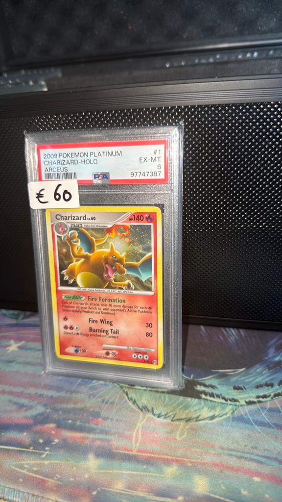 Charizard lv 60 holo met swirl psa 6, Ophalen of Verzenden, Zo goed als nieuw