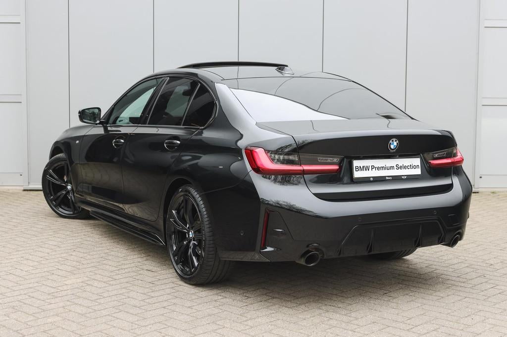 BMW 3 Serie 318i M Sport Automaat / M-Performance / Sportsto, Achterwielaandrijving, Gebruikt, Alcantara, Zwart