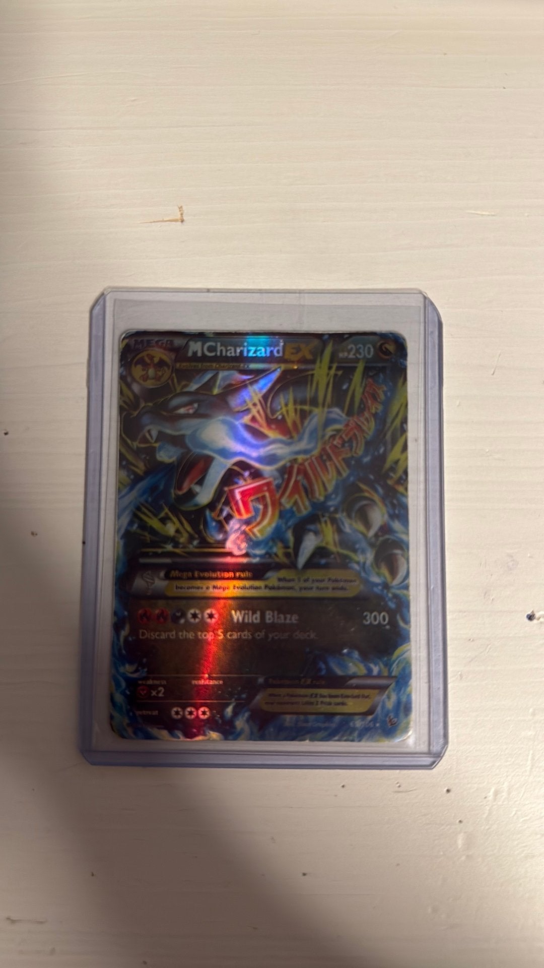 Mega charizard EX 69/106, Ophalen of Verzenden, Gebruikt, Speelkaart(en)