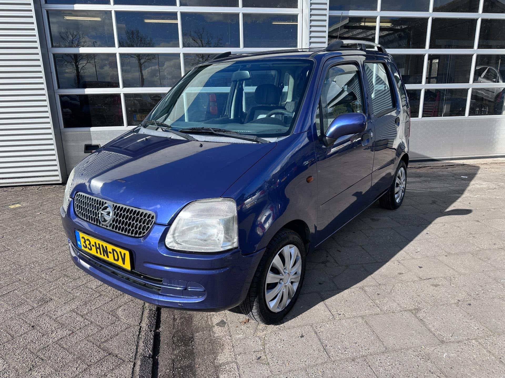 Opel Agila 1.2-16V Comfort, Auto's, Voorwielaandrijving, Gebruikt, 31 €/maand, Blauw