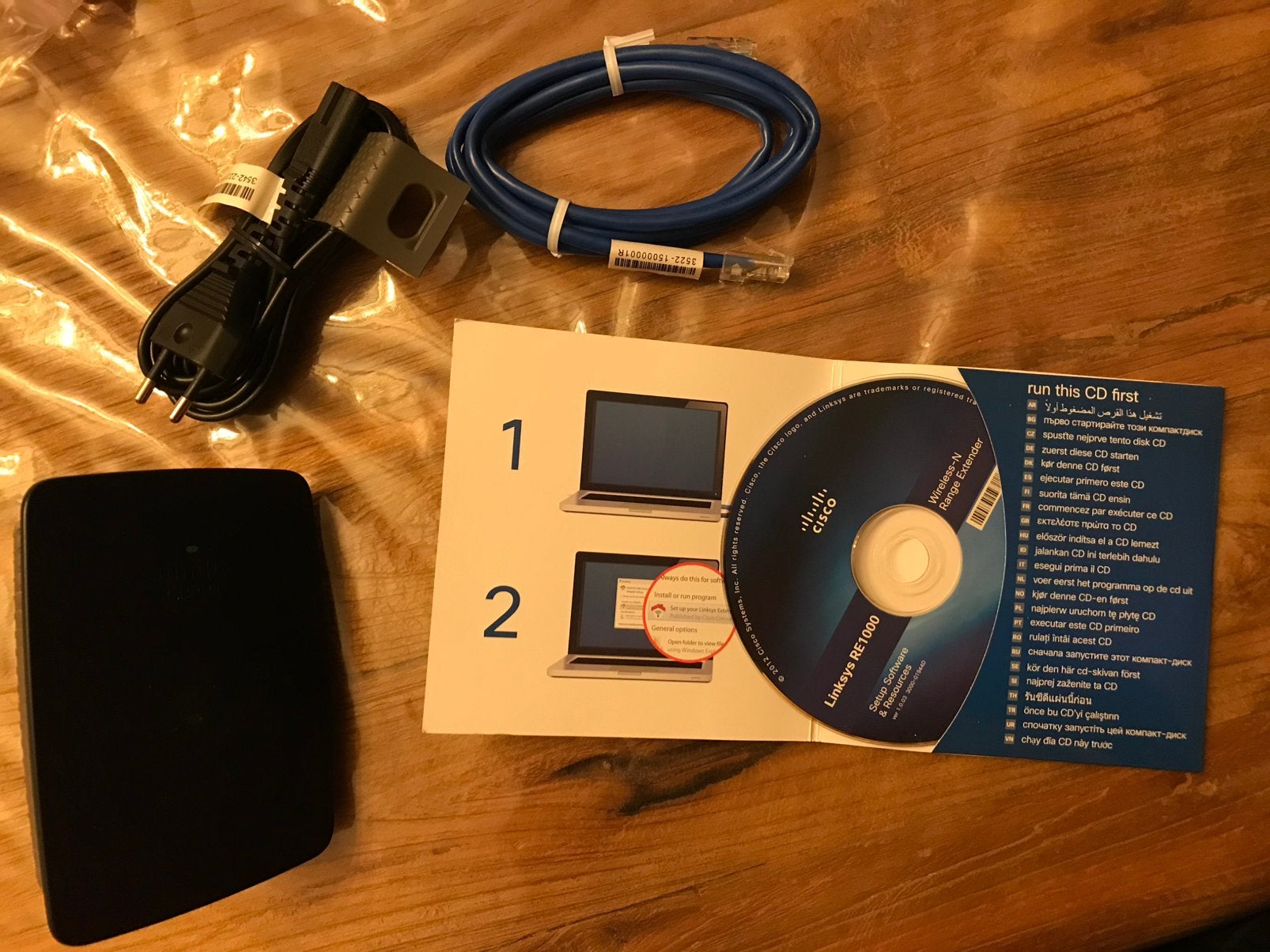 Cisco Linksys RE1000 WiFi Versterker - Compleet met CD, Ophalen of Verzenden, Zo goed als nieuw