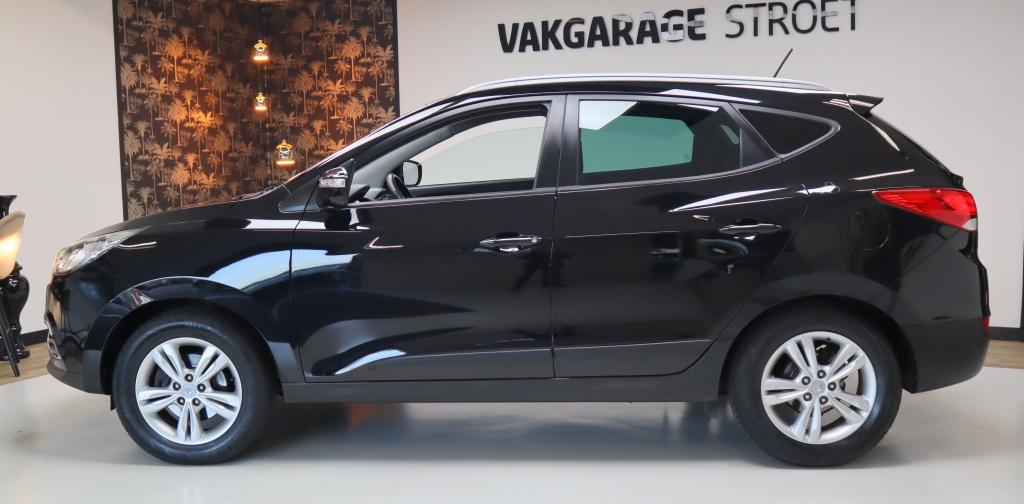 Hyundai ix35 2.0i Bus.Ed. | cruise | cam | clima | trekhaak, Gebruikt, Zwart, 4 cilinders, Leder en Stof