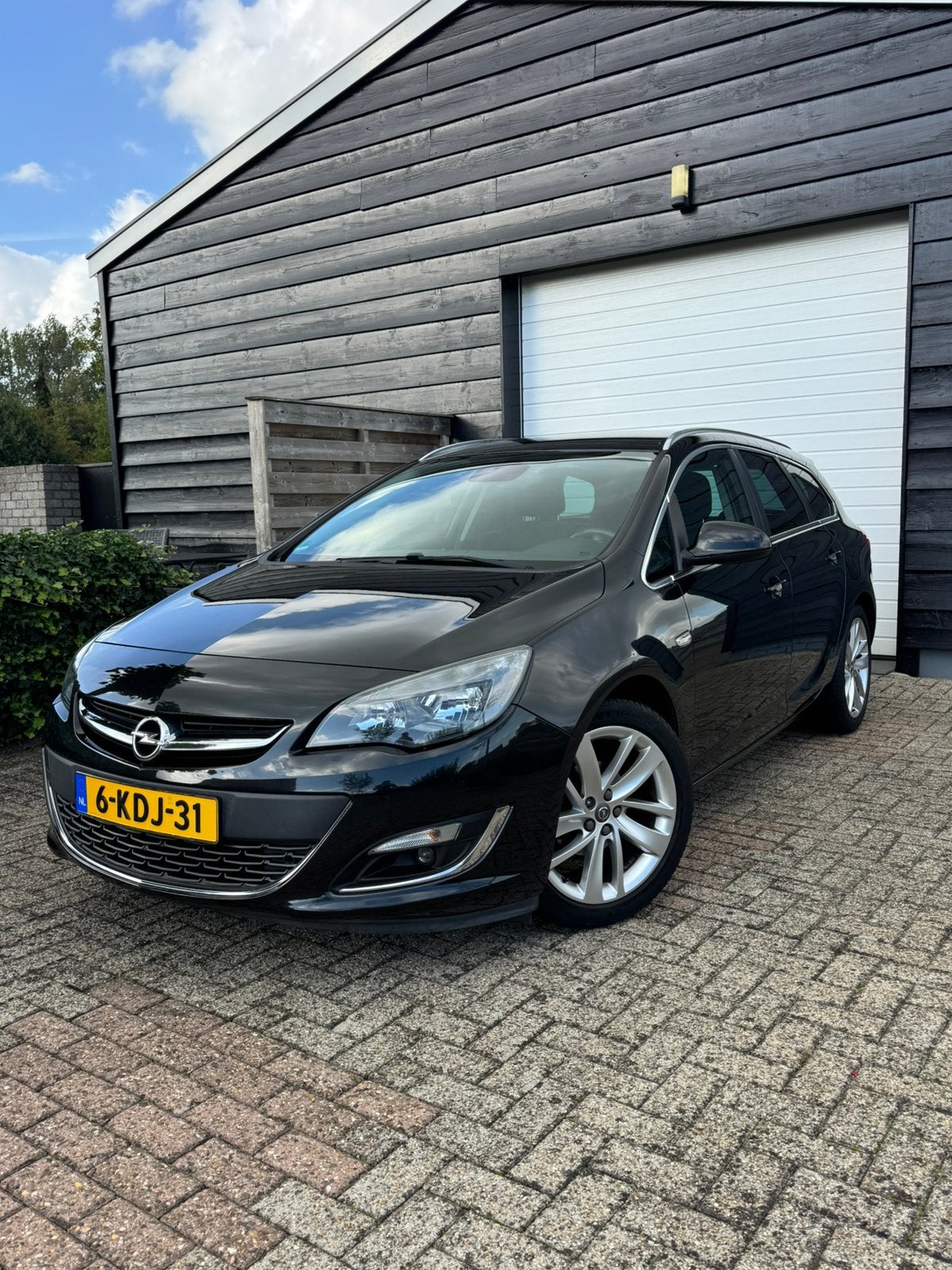 Opel Astra 1.4 Turbo ST | Trekhaak | Navigatie | Bluetooth, Auto's, Voorwielaandrijving, Euro 5, Stof, Zwart