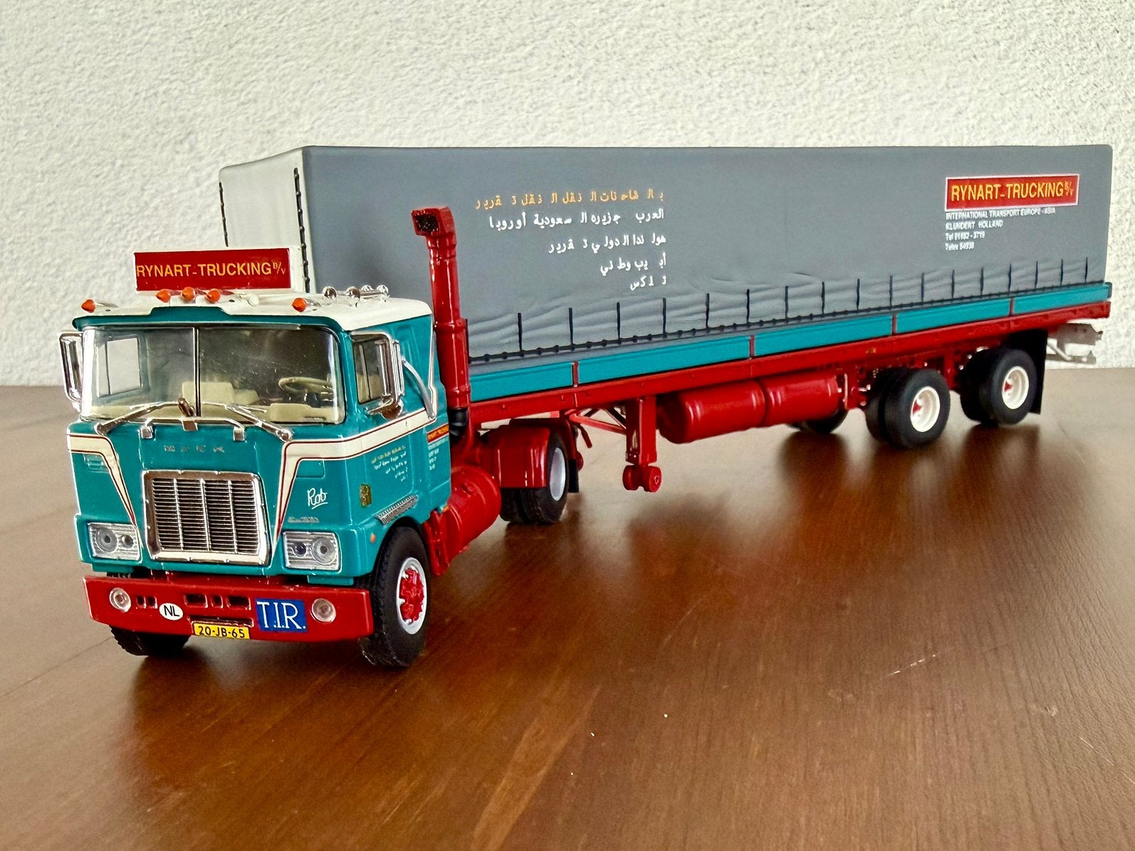 WSI Rynart Trucking, Mack F700 Curtainside trailer, Hobby en Vrije tijd, Modelauto's | 1:50, Ophalen of Verzenden, Zo goed als nieuw