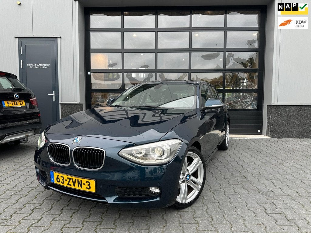 BMW 1-serie 116i Upgrade Edition AUTOMAAT LEER OPEN DAK, Euro 5, Gebruikt, Zwart, 4 cilinders