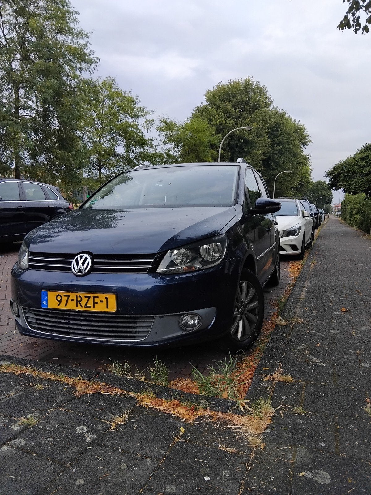 Volkswagen Touran 1.2 TSI 77KW BMT 2011 Blauw, 730 kg, 4 cilinders, Blauw, Origineel Nederlands