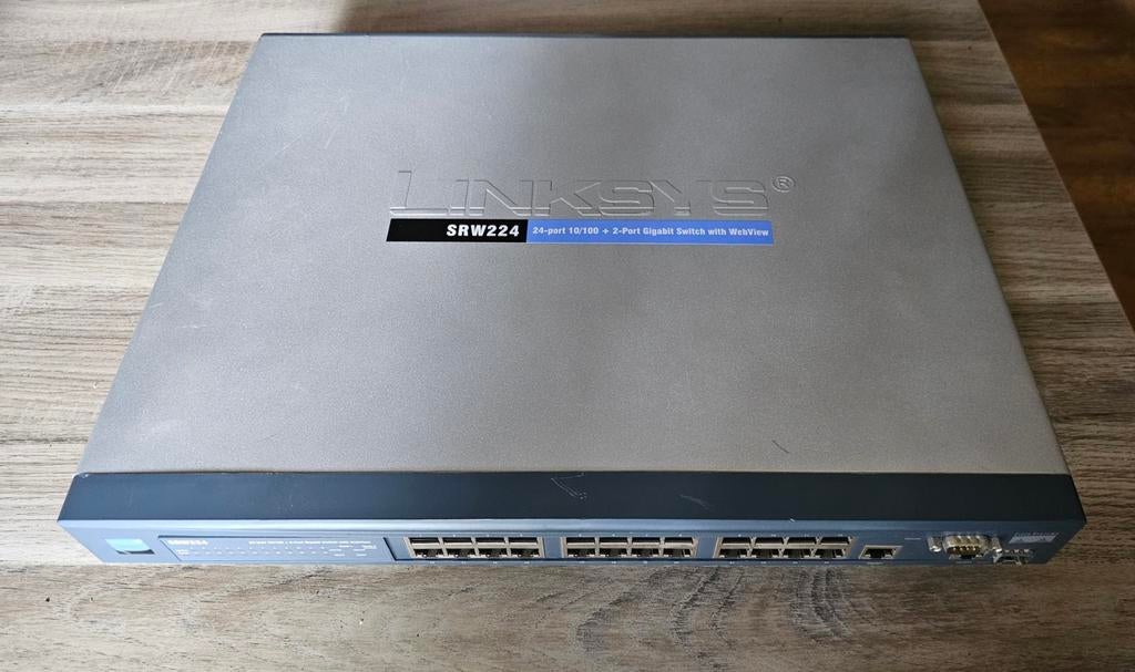 Linksys SRW224P 24-Port 10/100 + 2-Port Gigabit Switch: WebV, Computers en Software, Netwerk switches, Ophalen of Verzenden, Refurbished
