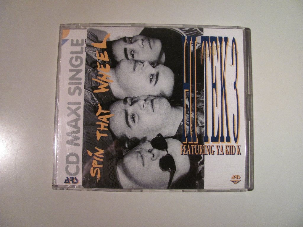 Hi Tek 3 cd / single Spin That Wheel feat Ya Kid K, Cd's en Dvd's, Cd's | Dance en House, Ophalen of Verzenden, Gebruikt, Overige genres