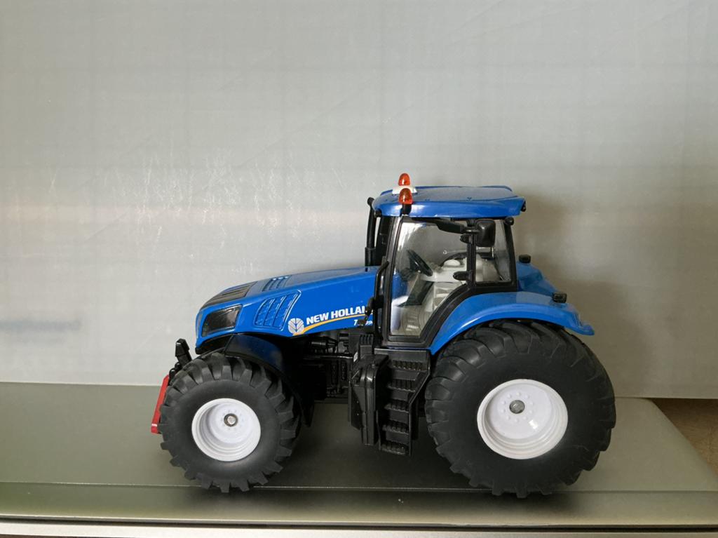 New Holland trekker 1:32 T8.390, Ophalen of Verzenden, Zo goed als nieuw, Tractor of Landbouw, SIKU