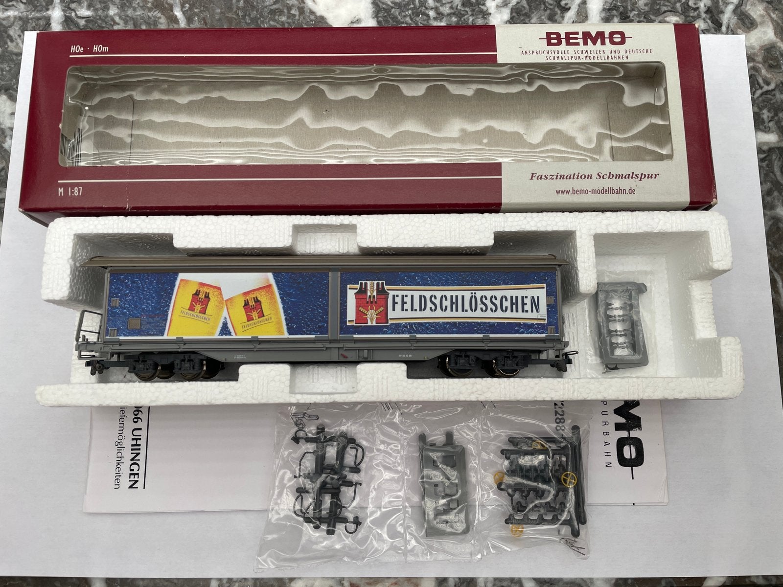 Bemo H0m RhB schuifwandwagen “Feldschlösschen” - 2288 147, Hobby en Vrije tijd, Overige merken, Gelijkstroom, Wagon, Ophalen of Verzenden