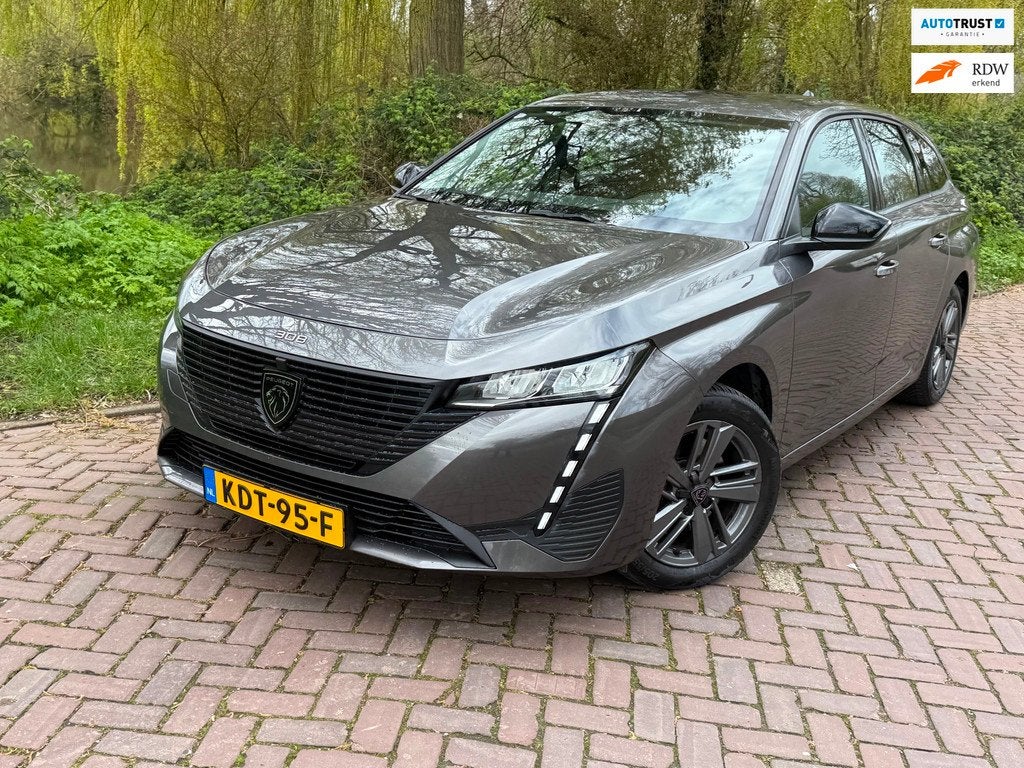 Peugeot 308 SW 1.2 PureTech Allure 130 PK Aut.1 Eig. 49000 k, Auto's, Peugeot, 1199 cc, Nieuw, 3 cilinders, Parkeersensor