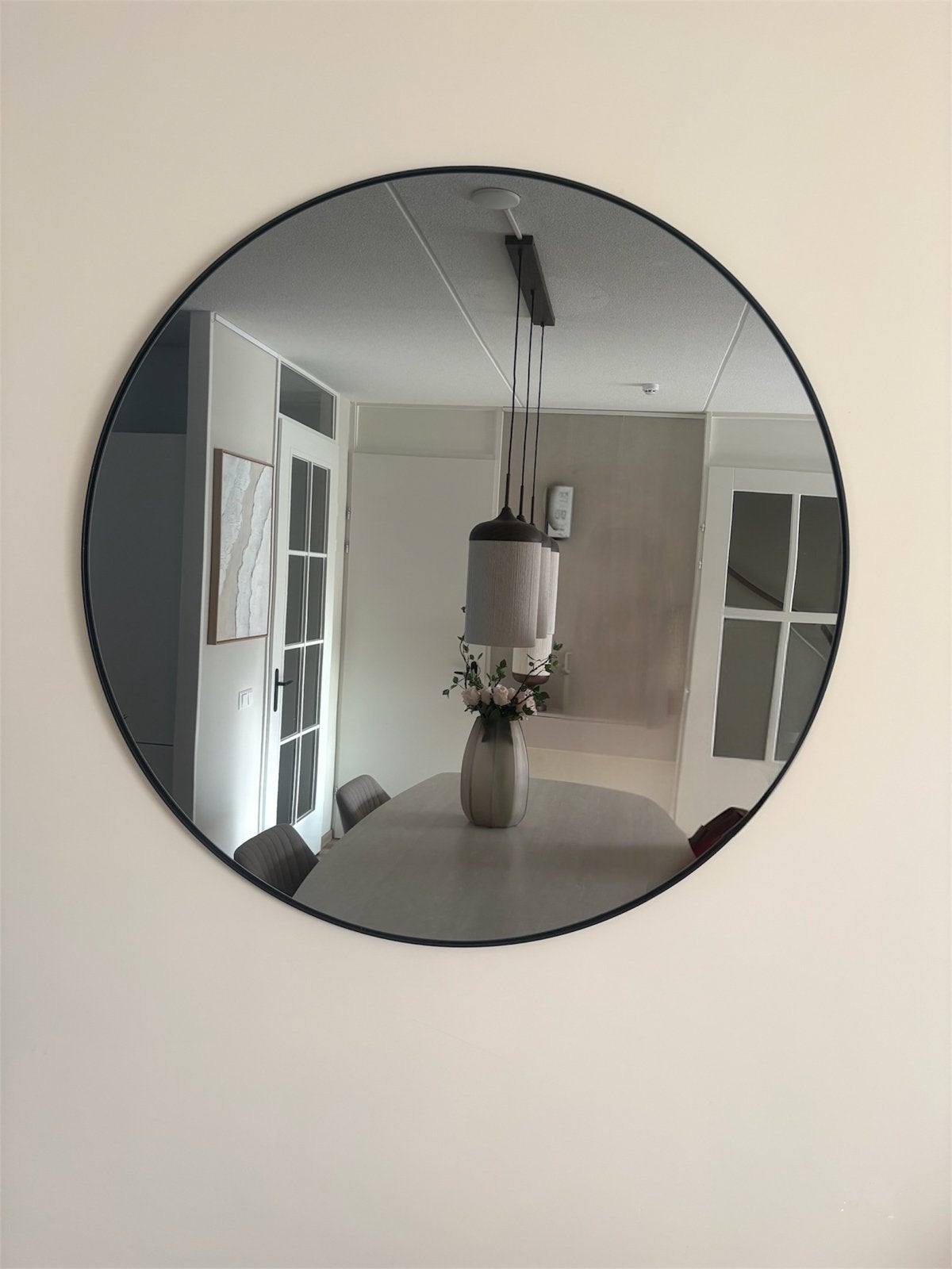 Elegante  spiegel met zwarte metalen rand en rookglas, Ophalen, Rond, Zo goed als nieuw, 75 tot 100 cm
