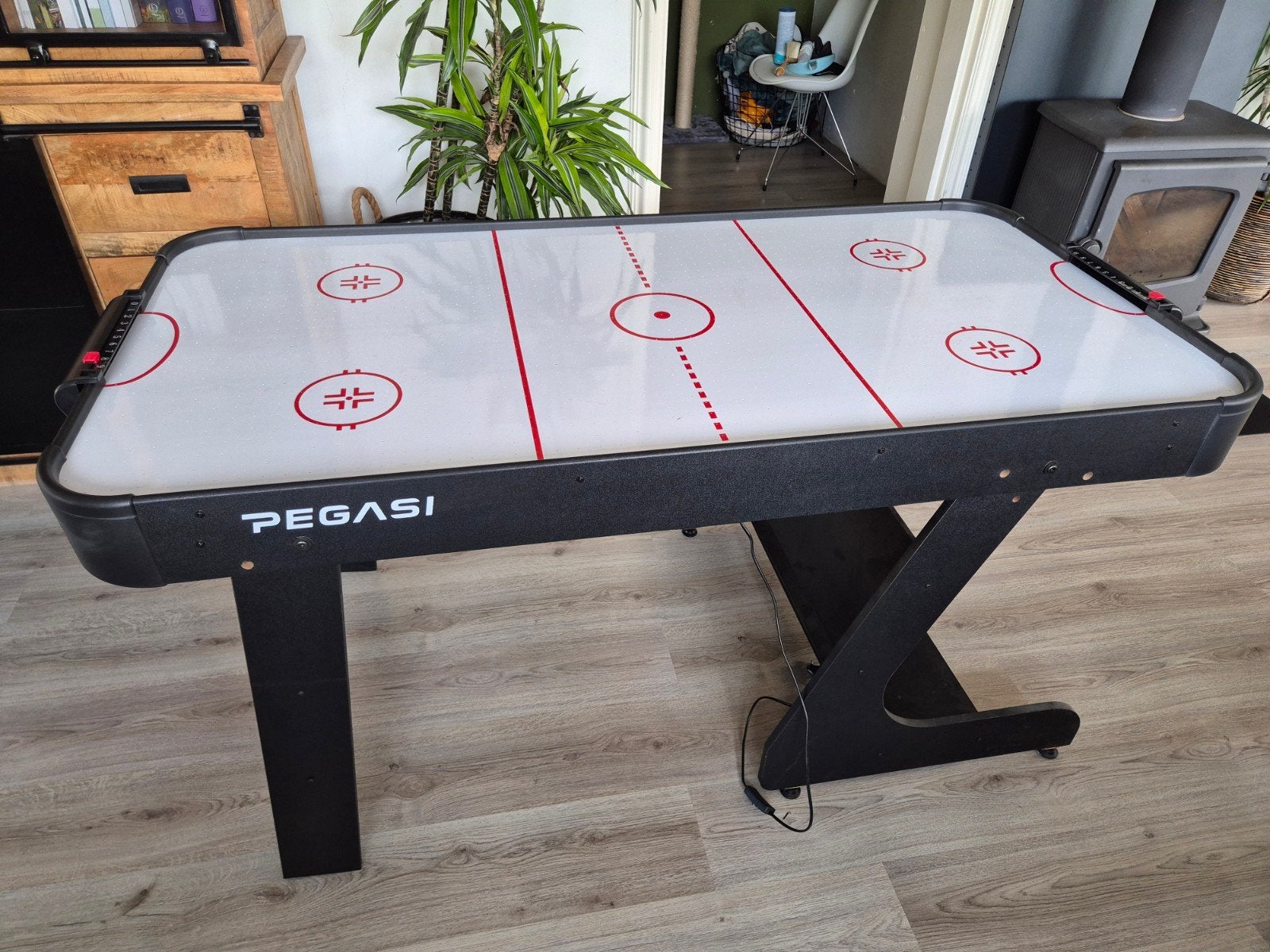 Pegasi airhockeytafel inklapbaar, Ophalen