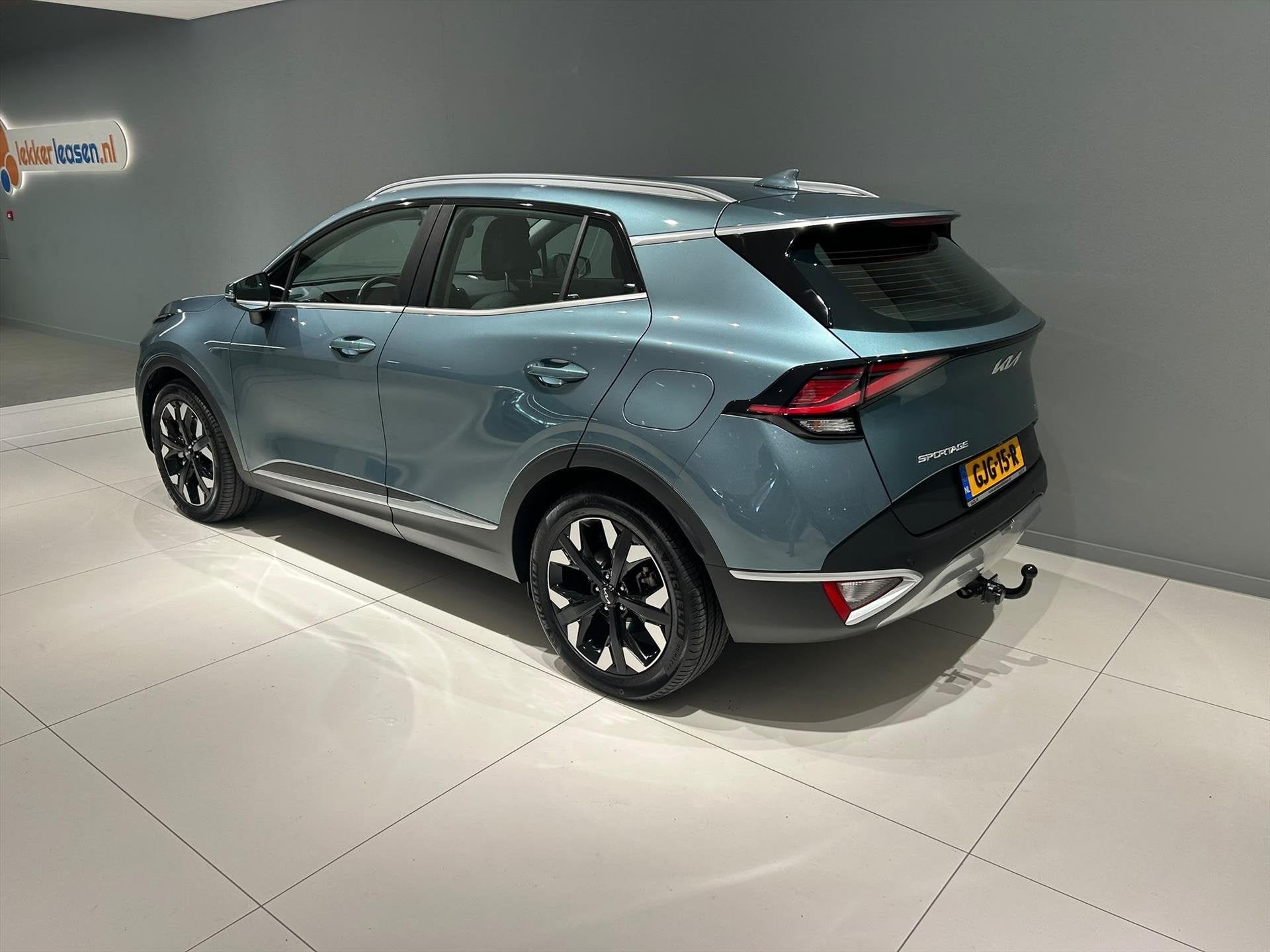 KIA Sportage 1.6 T-GDi 265pk Plug-In Hybrid AT6 4WD DynamicL, Auto's, Automaat, Stof, Gebruikt, 4 cilinders