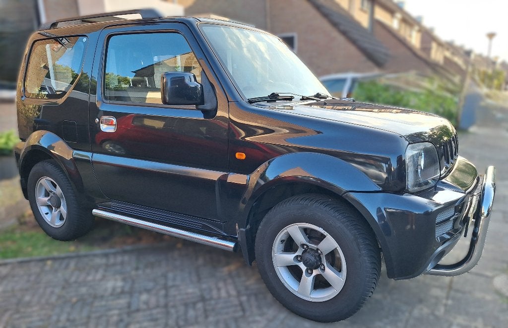 Suzuki Jimny 1.3 4WD 2009 Zwart, Metallic lak, Stof, 40 €/maand, Zwart