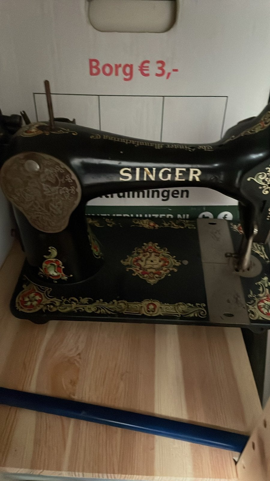 Singer naaimachine antiek, Ophalen