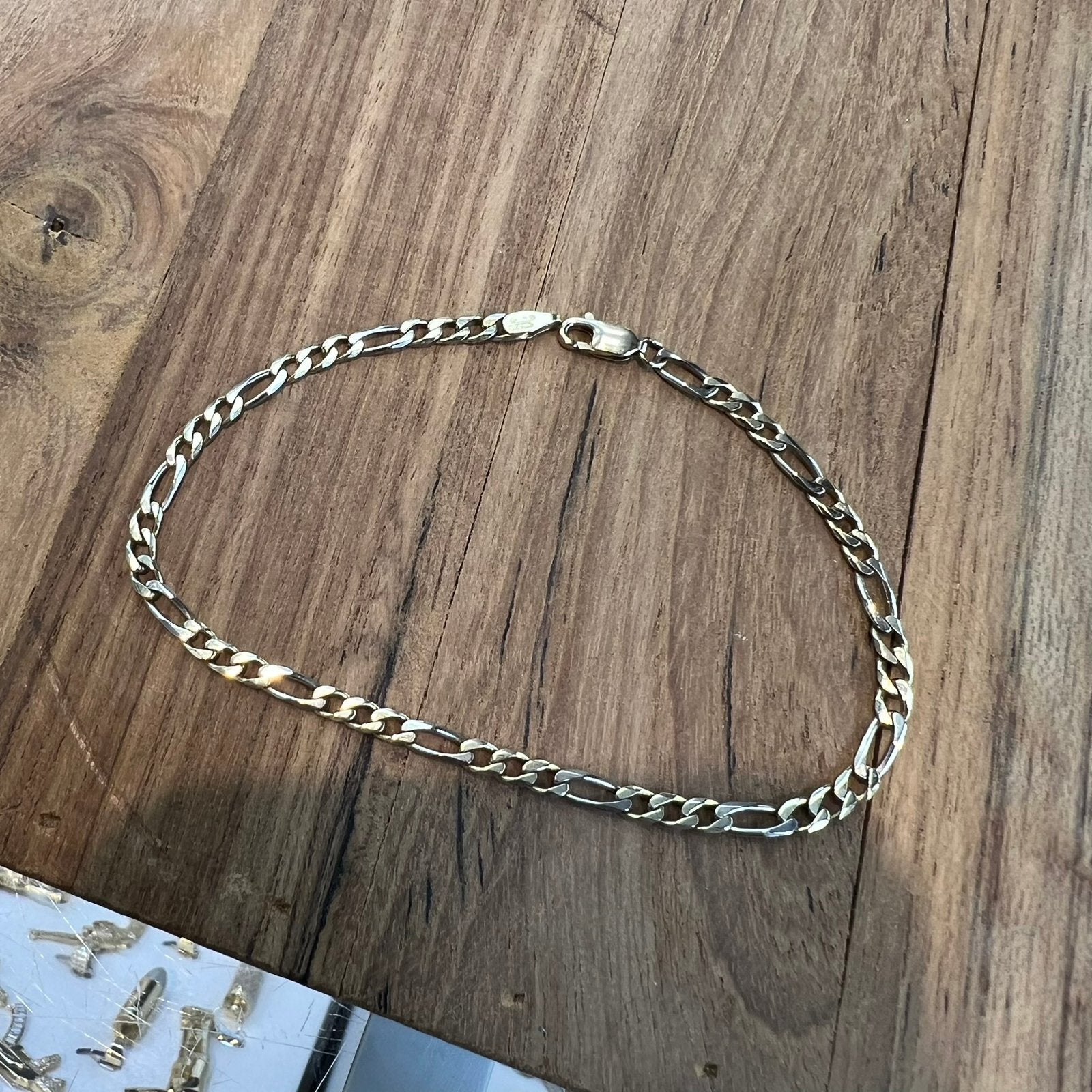 14k gouden armband figaro schakel massief, Ophalen of Verzenden, Zo goed als nieuw, Goud