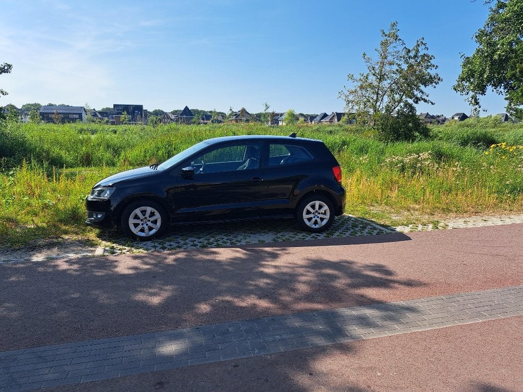 Volkswagen Polo 1.2 TDI 55KW BlueMotion 2011 Zwart, Auto's, Voorwielaandrijving, Euro 5, Stof, 74 pk