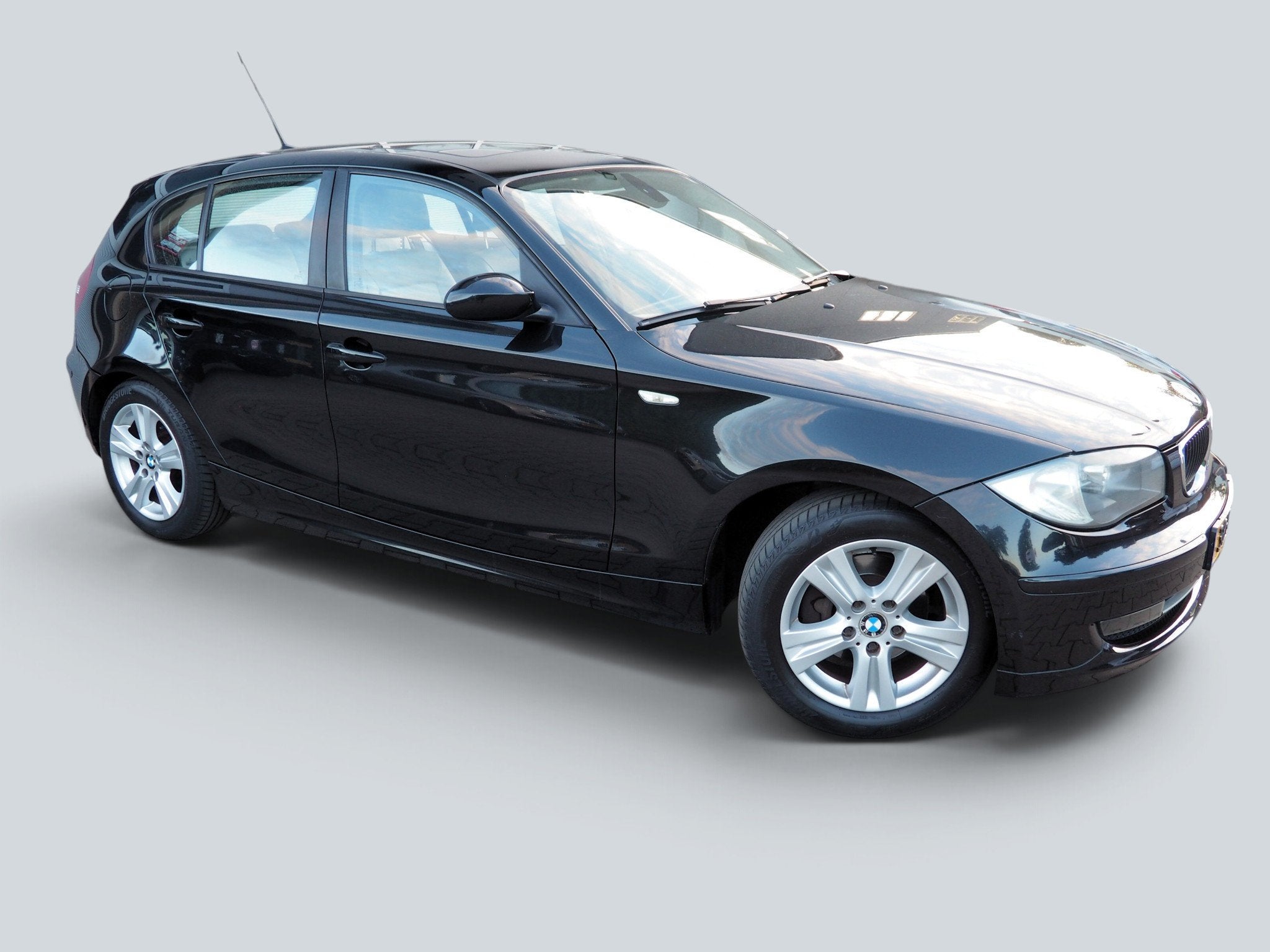 BMW 1 Serie 118i Executive SCHUIFDAK CLIMA CRUISE PARKEER S., Auto's, 1-Serie, Zwart, Euro 4, Lederen bekleding
