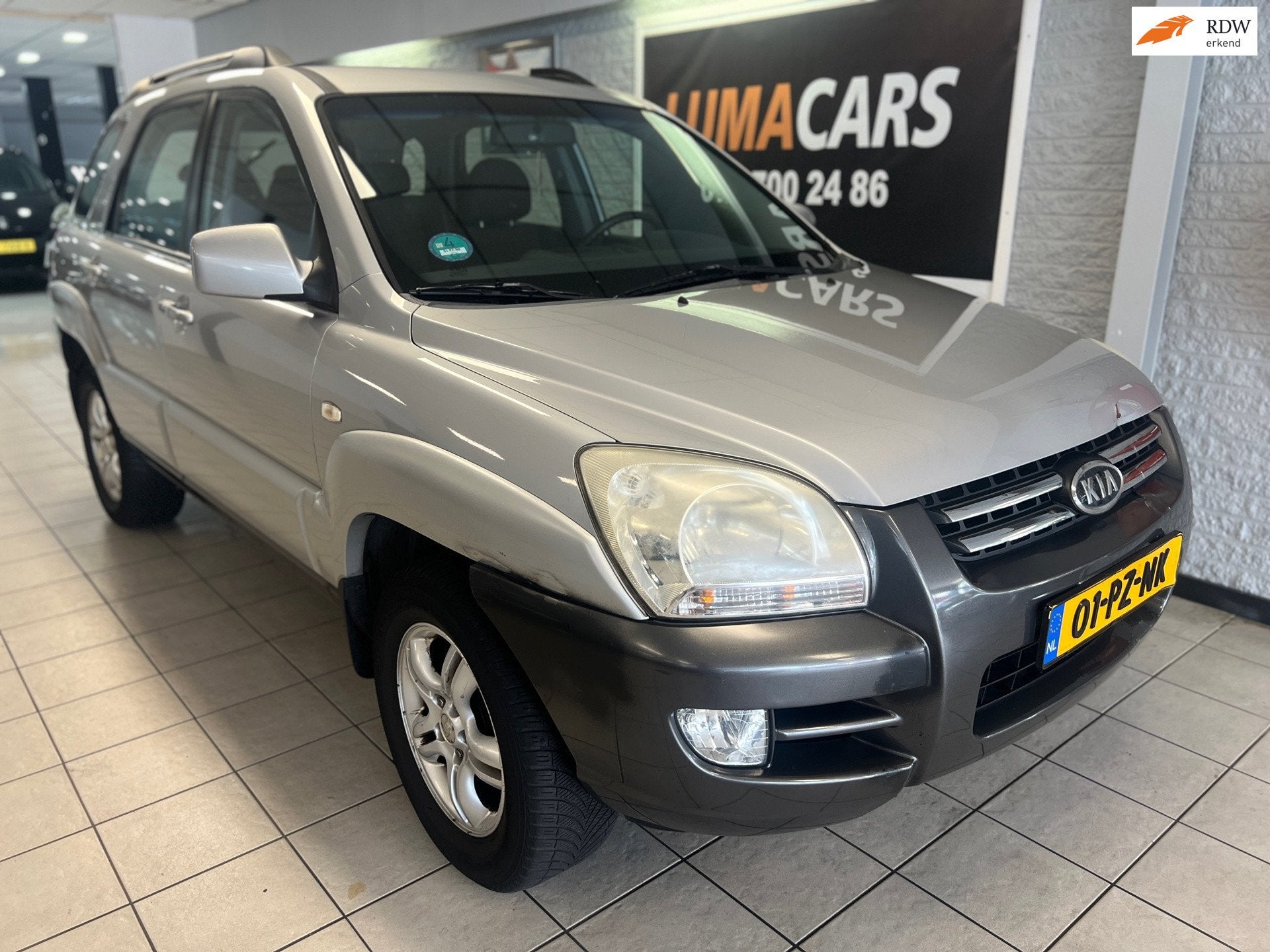 Kia Sportage 2.0 CVVT Comfort | APK/2027 | Cruise | Airco |, Auto's, 1442 kg, Gebruikt, 4 cilinders, Origineel Nederlands