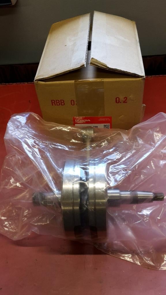Nieuwe originele Honda cr250 '05 t/m '07 krukas, Ophalen of Verzenden
