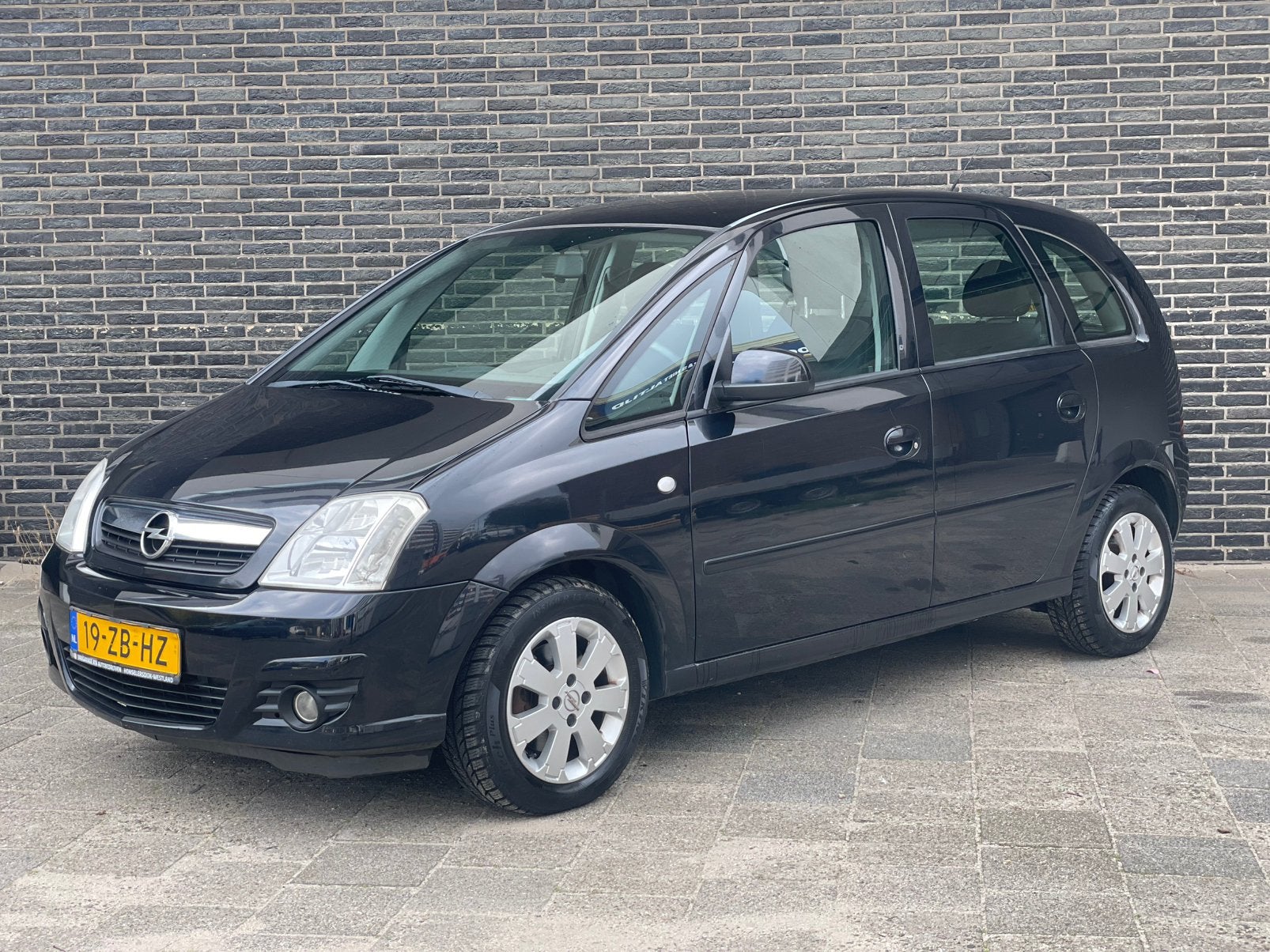 Opel Meriva 1.6 16V Nap ✅ 2007 Zwart Airco Apk Hoge instap, Auto's, Voorwielaandrijving, Zwart, 4 cilinders, Zwart