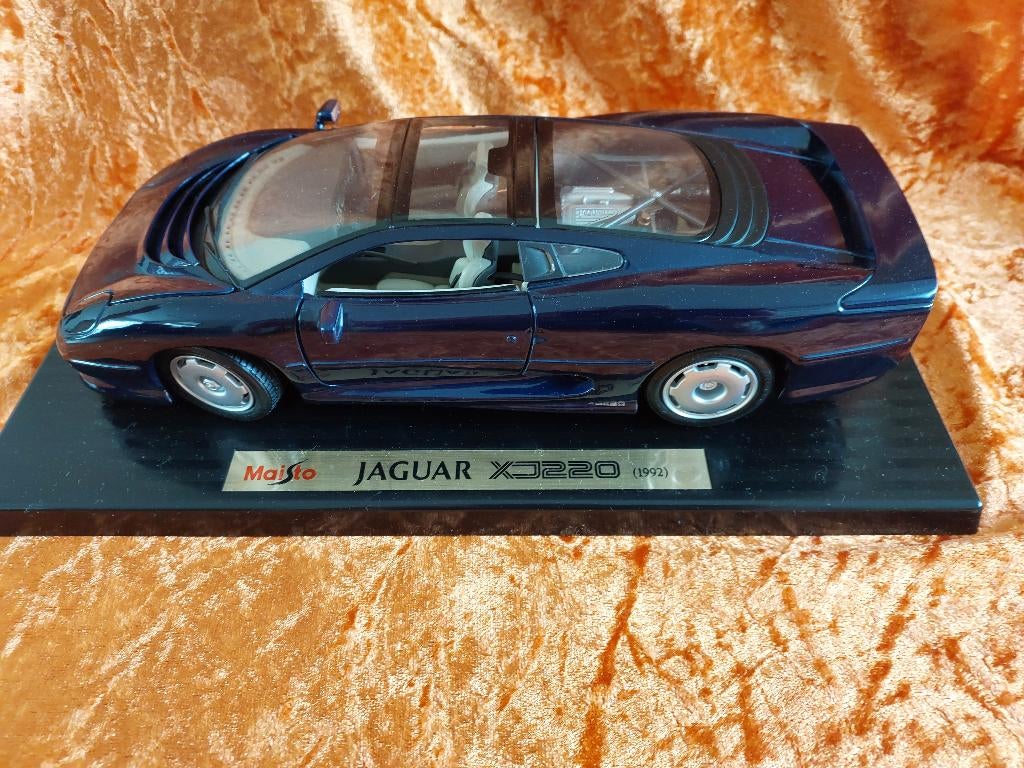 JAGUAR XJ220 1992  IN  PERFECTE STAAT MET DOOS MERK TROPHÉE, Ophalen of Verzenden, Nieuw, Auto, Maisto