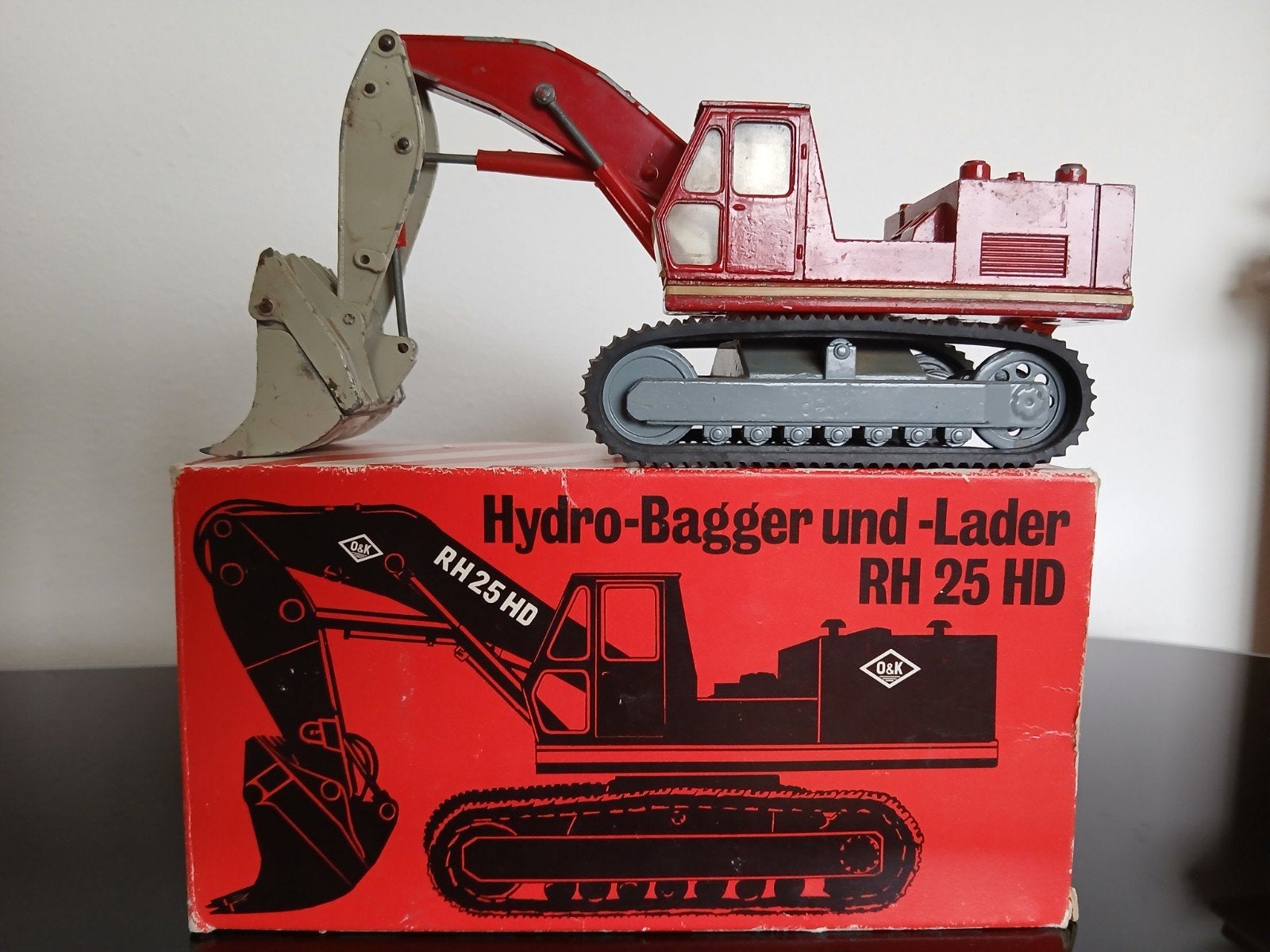 O&K RH25 Hydro-Bagger und -Lader met originele doos, Ophalen of Verzenden, Gebruikt, Bus of Vrachtwagen