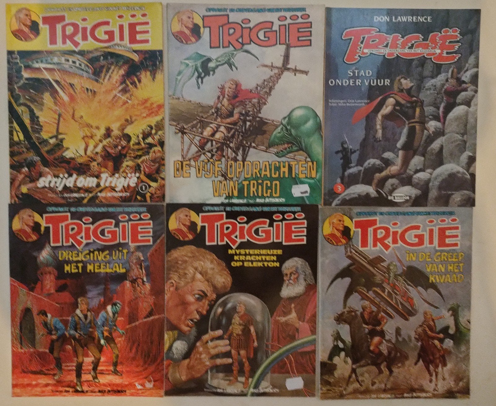 Trigie stripboeken -  reeks per stuk €1.75 (1e editie bieden, Meerdere stripboeken, Ophalen of Verzenden, Zo goed als nieuw, Don Lawrence