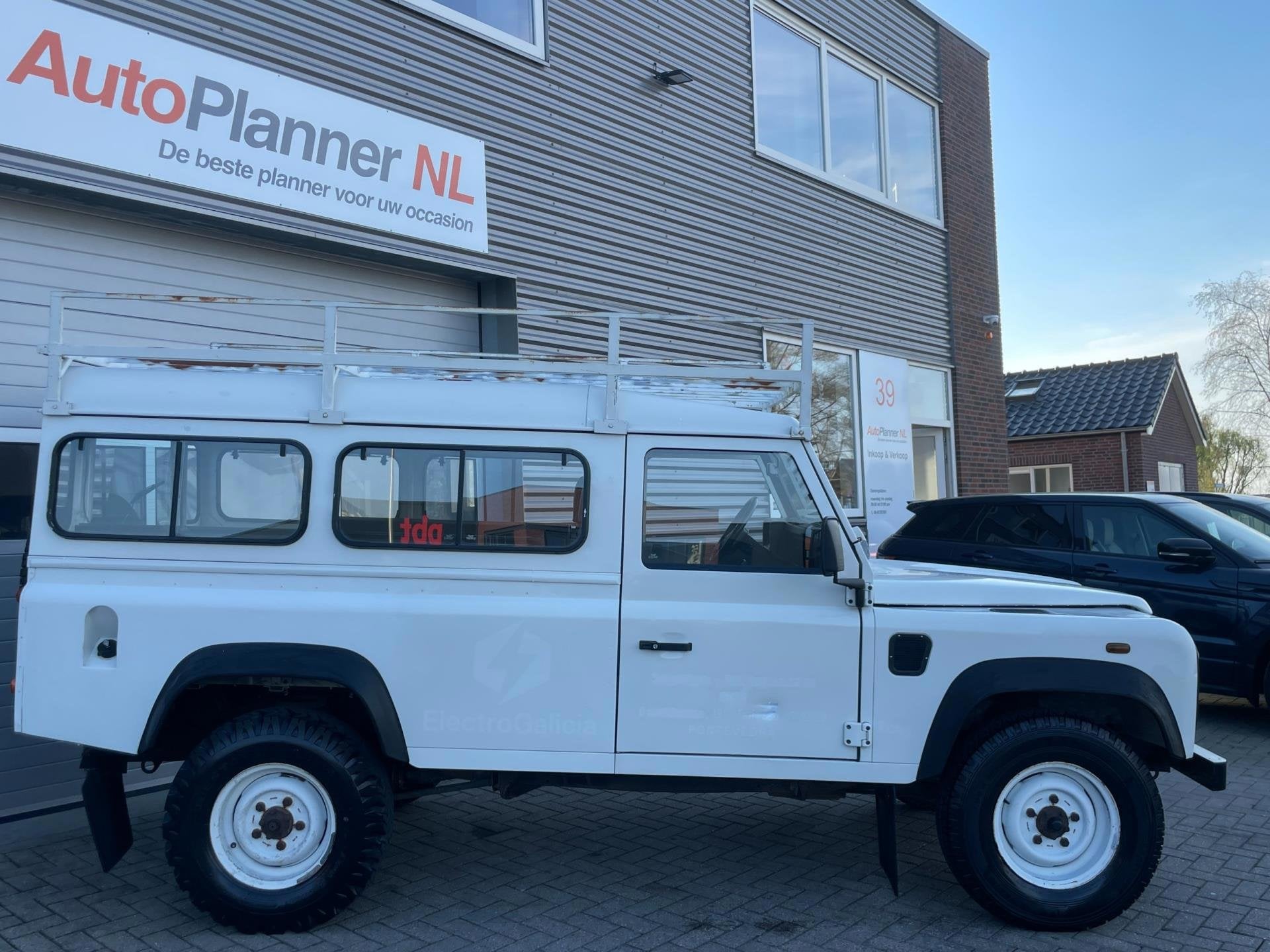 Land Rover Defender 2.5 Td5 110" County! 9-Persoons!, Stof, Origineel Nederlands, 2402 cc, SUV of Terreinwagen