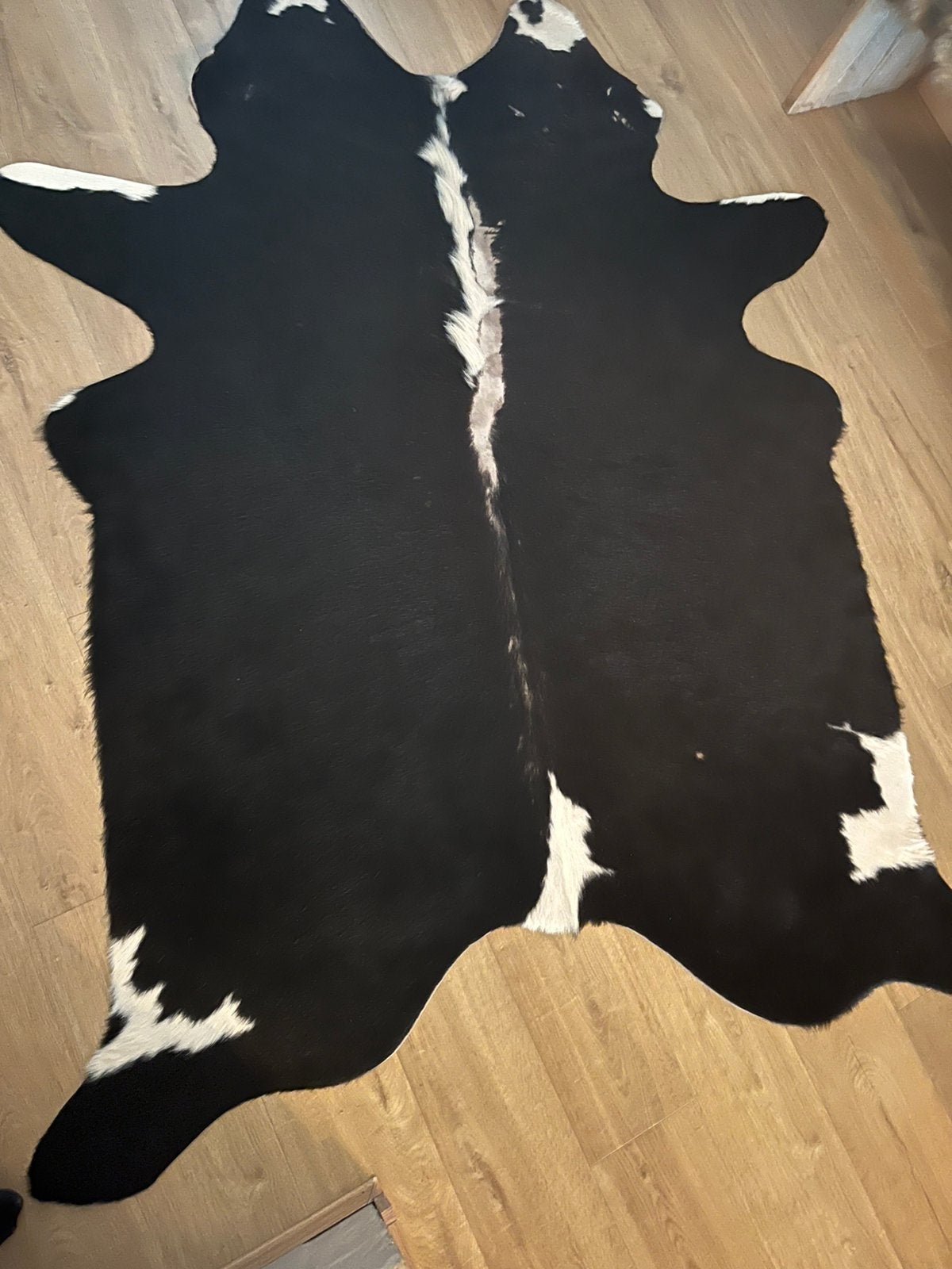 Zwart-wit koeienhuid vloerkleed, zo goed als nieuw, Zwart, 150 tot 200 cm, 200 cm of meer, Ophalen of Verzenden