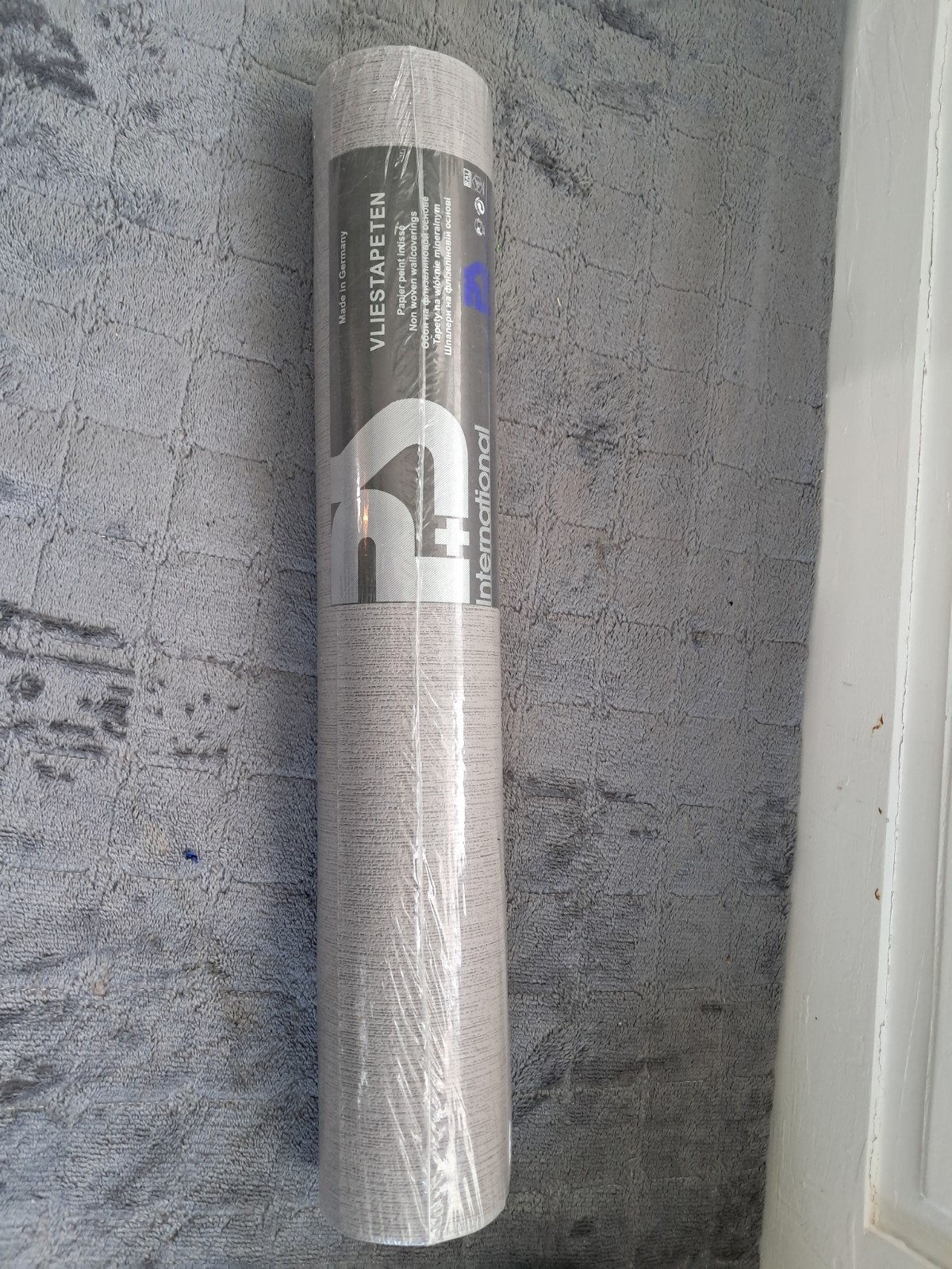 Vliesbehang - Grijs met structuur - Nieuw in verpakking, Overige merken, Structuur, Modern, Ophalen of Verzenden