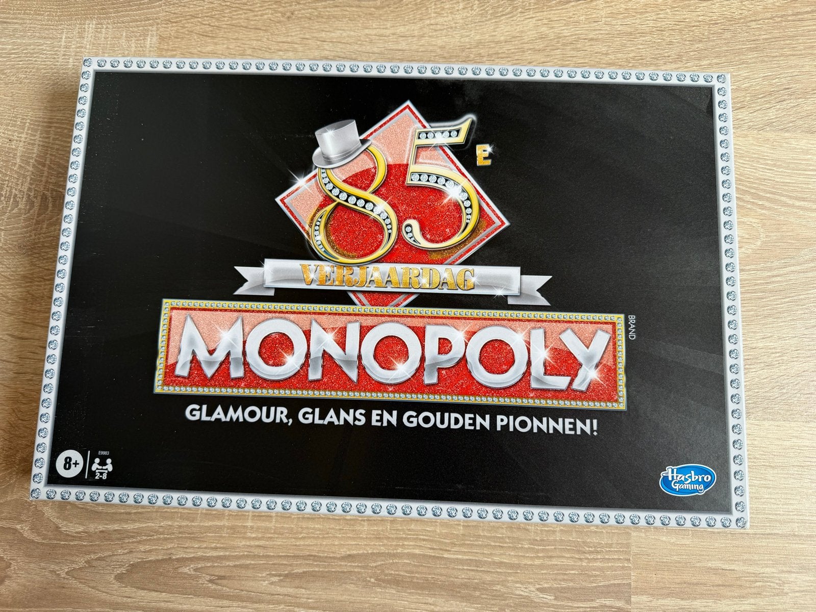 Monopoly 85e Verjaardag Editie - Glamour, Glans en Gouden Pi, Hobby en Vrije tijd, Gezelschapsspellen | Bordspellen, Drie of vier spelers