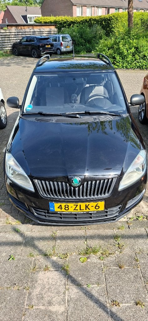 Skoda Fabia 1.2 TSI 63KW Combi 2013 Zwart, Voorwielaandrijving, Euro 5, Stof, 40 €/maand