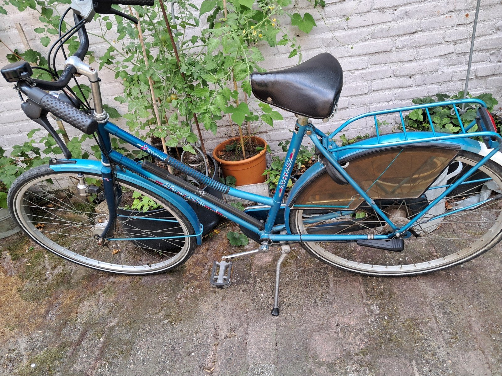 Damesfiets, Ophalen