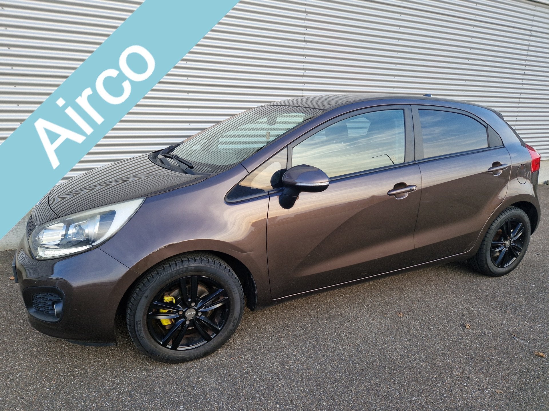 Kia Rio 1.2 CVVT Super Pack Climatronic keyless PDC NAP, Euro 5, Gebruikt, 4 cilinders, Bruin