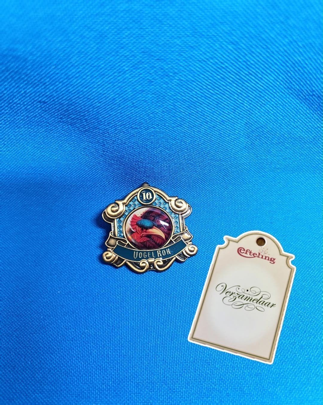 Efteling jubileum pin 10 jaar Vogelrok, Ophalen of Verzenden, Nieuw, Button of Speldje