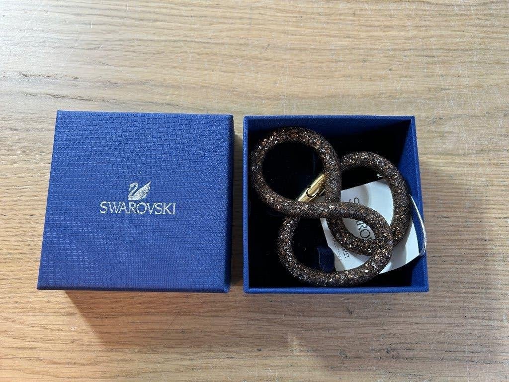Swarovski Stardust Bracelet Armband Bruin/Goud, Sieraden, Tassen en Uiterlijk, Ophalen of Verzenden, Zo goed als nieuw, Leer